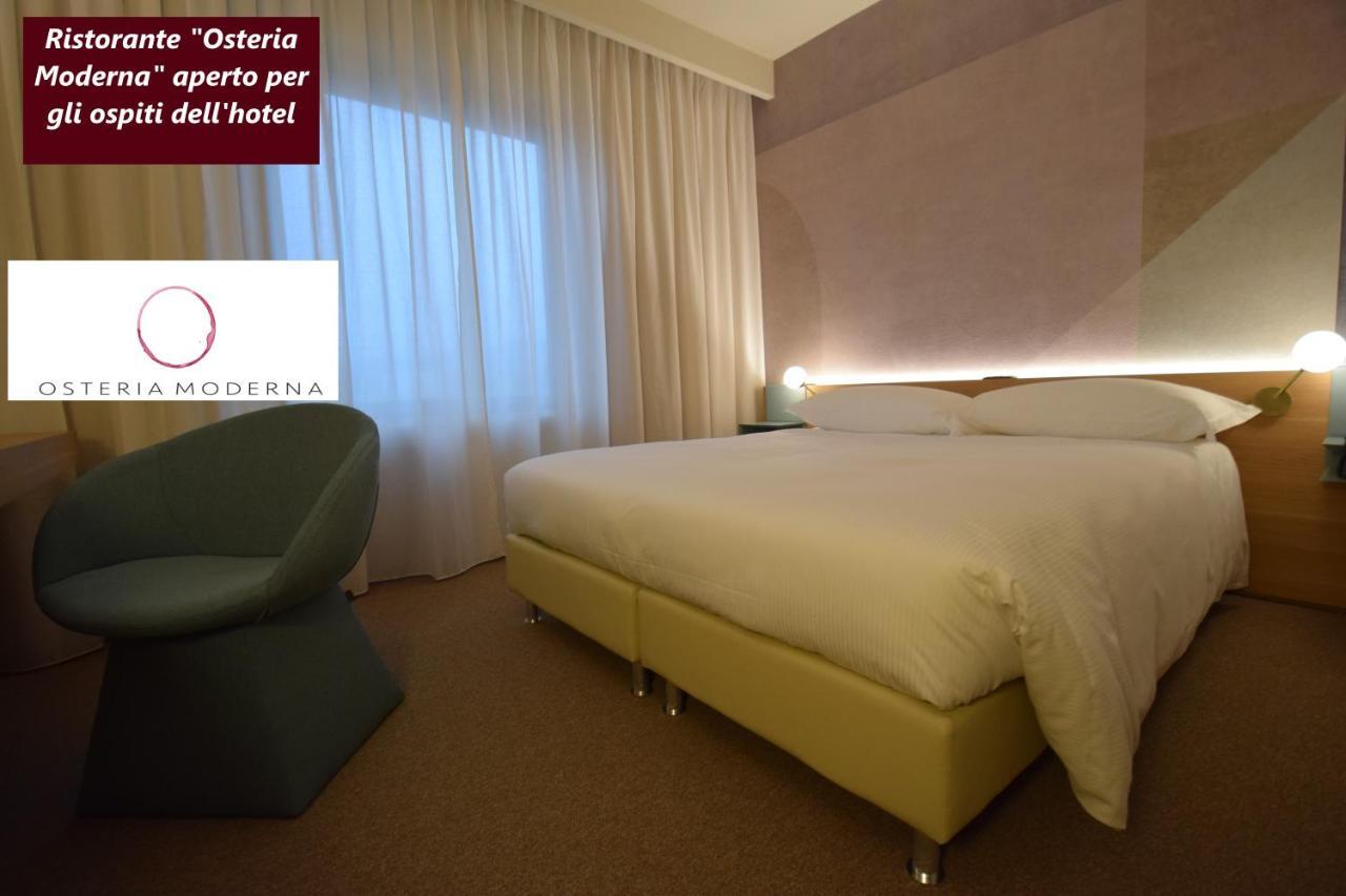 Garden Hotel อาเรซโซ ภายนอก รูปภาพ